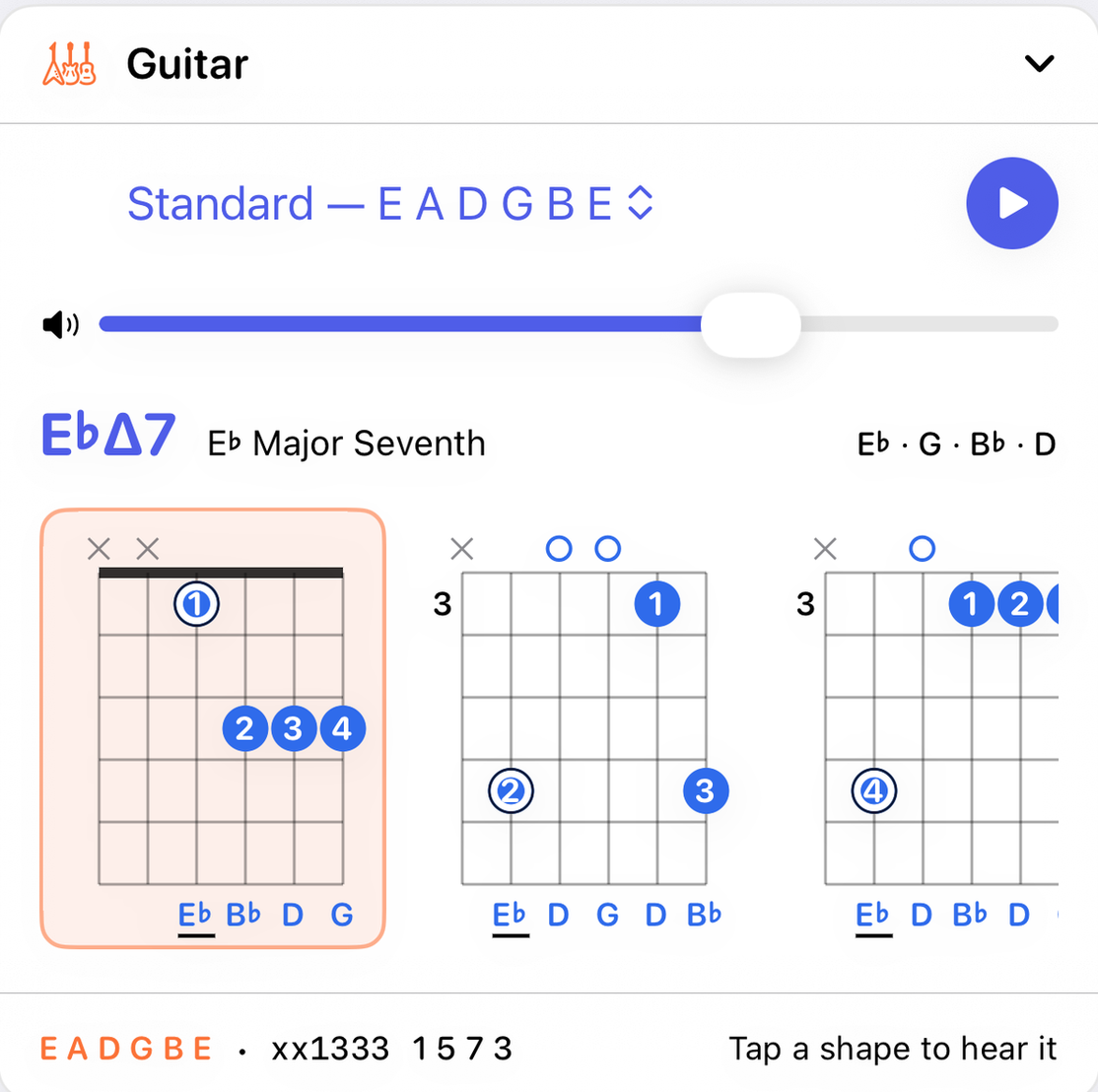 The Guitar panel on iPhone showing three shapes for E-flat major seventh in standard tuning, the first a barre at the first fret